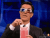 steven colbert eating popcorn 3.gif