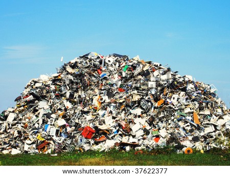 stock-photo-pile-of-metallic-waste-on-a-recycle-site-37622377.jpg