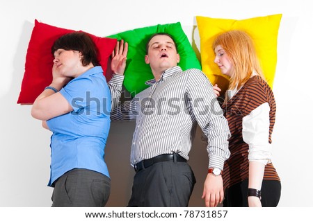 stock-photo-three-business-people-are-sleeping-together-at-office-78731857.jpg