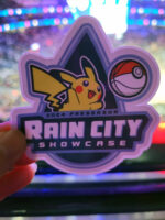 Rain-City-Showcase-Sticker-150x200.jpg
